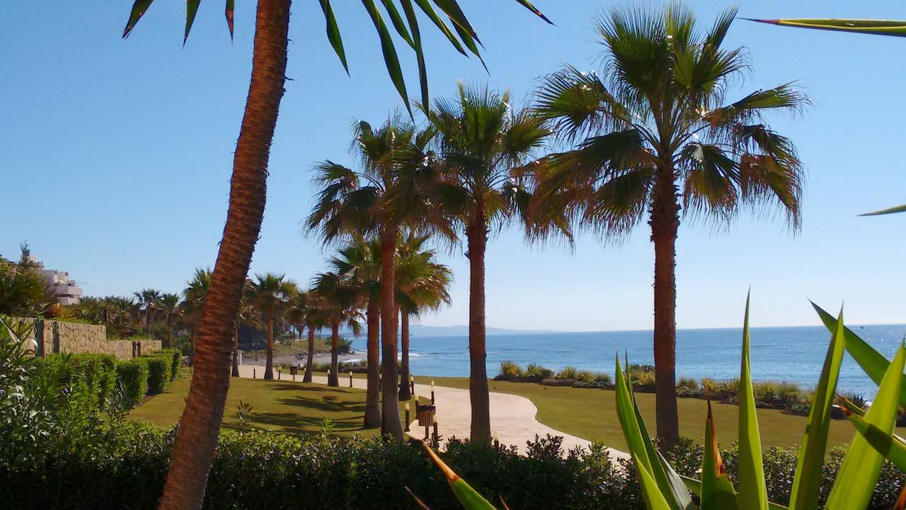 Image shows sea front walking boulevard that joins Estepona and all the beaches