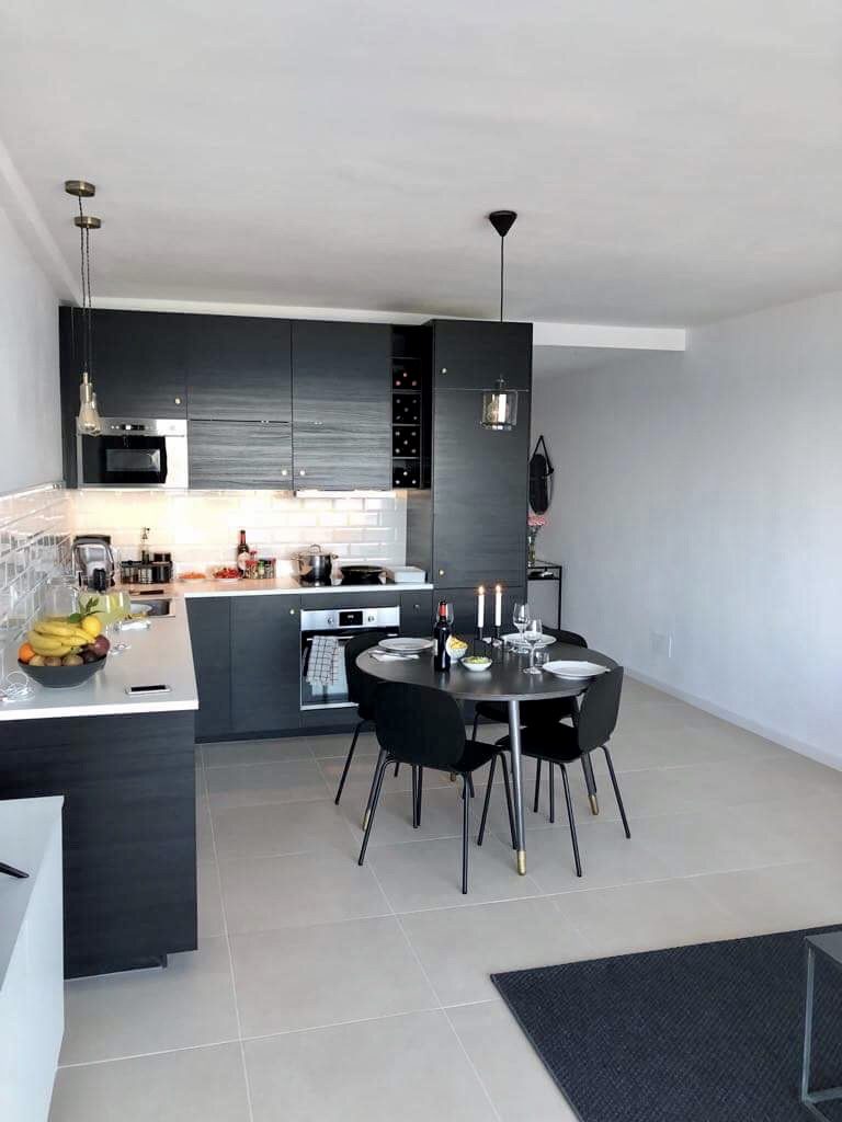 Luxury Penthouse Apartment in Estepona Casa de Gran Vista. Image shows large modern open kitchen with fixtures