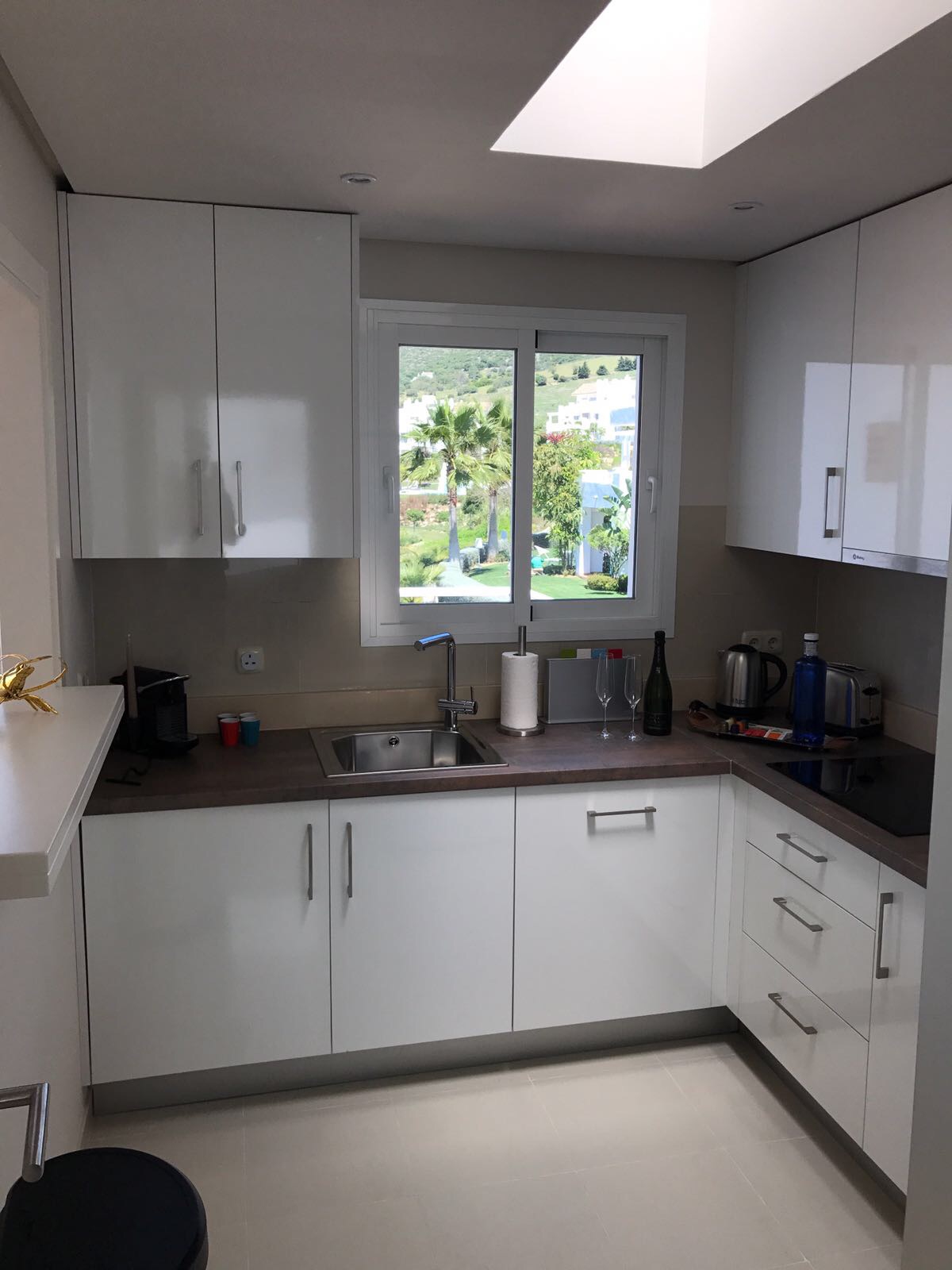 Image shows the recently refurbished kitchen of this stylish penthouse in Alcazaba Lagoon
